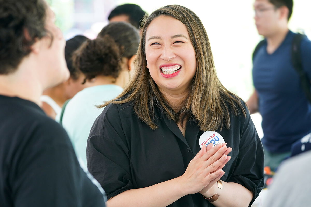 <i>Seth Wenig/AP</i><br/>Assemblywoman Yuh-Line Niou meets with supporters and volunteers before canvassing a neighborhood in Brooklyn on August 14.