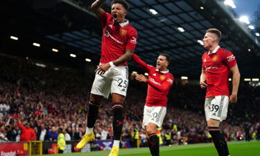 Jadon Sancho celebrates scoring Manchester United's first goal.