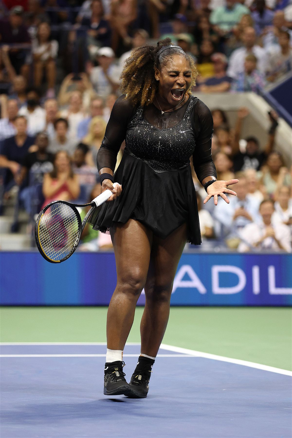 <i>Al Bello/Getty Images</i><br/>Serena Williams reacts after winning the first set against Danka Kovinić during their first round match at the 2022 US Open on August 29 in New York.