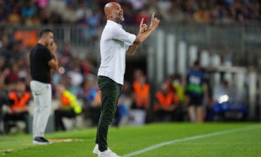 Pep Guardiola delivers instructions to his Manchester City side against Barcelona.