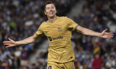 Robert Lewandowski celebrates scoring Barcelona's third goal against Real Sociedad at the Anoeta stadium in San Sebastian