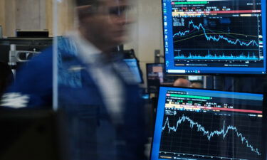 Traders work on the floor of the New York Stock Exchange (NYSE) on August 26 in New York City.