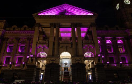 Melbourne Town Hall turned pink on August 9 to honor Olivia Newton-John.