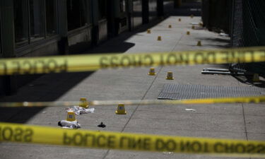 The scene of a mass shooting is blocked off with police tape on April 3 in Sacramento