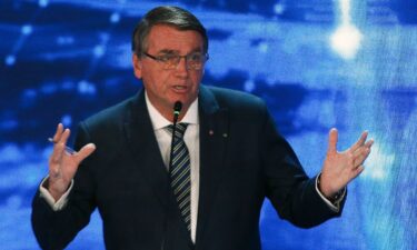 Brazilian President Jair Bolsonaro gestures during the presidential debate in Sao Paulo