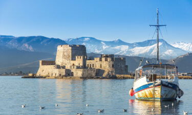 The Bourtzi water castle is a small island with a fortress at the coast of Nafplio in Greece