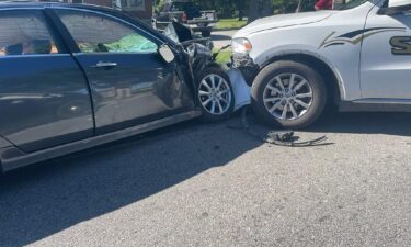 A Macon County deputy crashed into a car head-on that was headed toward the route of the Macon County High homecoming parade.