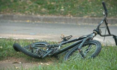 A local school district's superintendent hit by car a 12-year-old boy while riding his bike in his neighborhood.
