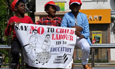 Young boys take part in an awareness rally to mark 'World Day Against Child Labour' in Chennai