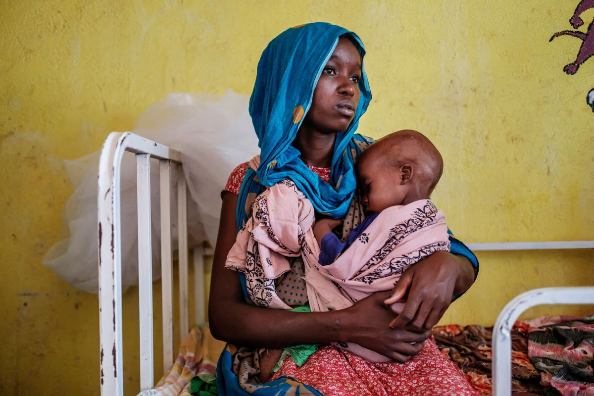 <i>Eduardo Soteras/AFP/Getty Images</i><br/>The world is moving backward in the combat against poverty and disease. A woman is seen here holding a malnourished child at the nutrition unit of the Kelafo Health Center in the town of Kelafo