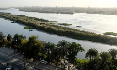 The Nile River is seen flowing through the Egyptian capital Cairo's southern suburb of Kozzika in 2019.