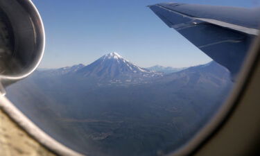 Rescuers are trying to reach survivors of a climbing expedition on Eurasia's highest volcano that has already claimed eight lives as of September 5. Klyuchevskaya Sopka volcano is pictured here in September of 2005.