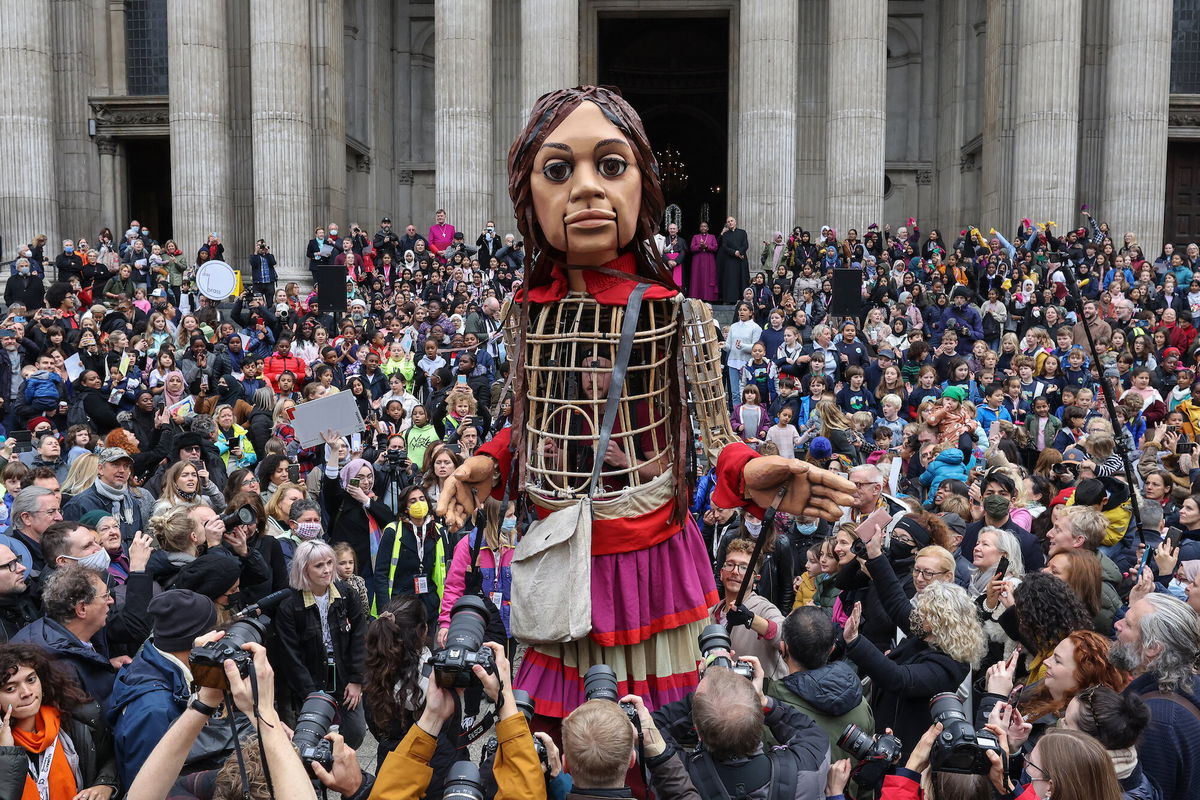 <i>Hollie Adams/Getty Images</i><br/>Little Amal arrives at St Paul's Cathedral in London on October 23