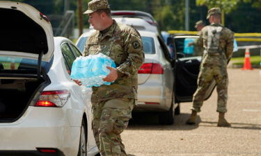 Mississippi National Guardsmen helped distribute water on September 2 after the city's system partially failed.