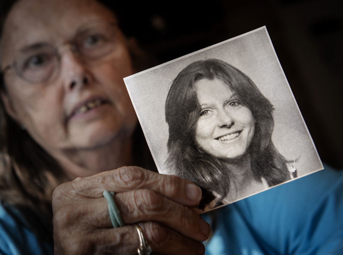 <i>Bill O'Leary/The Washington Post/Getty Images</i><br/>Veronique Duperly holds a photo of her sister