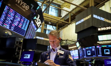 A trader works on the floor of the New York Stock Exchange (NYSE) in New York City