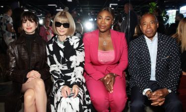 Anne Hathaway and Anna Wintour sit next to Serena Williams and Eric Adams at the Michael Kors Spring/Summer 2023 show in New York City.