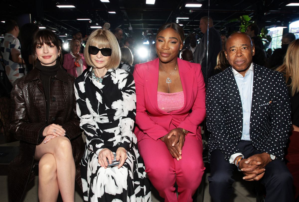 <i>Dimitrios Kambouris/Getty Images</i><br/>Anne Hathaway and Anna Wintour sit next to Serena Williams and Eric Adams at the Michael Kors Spring/Summer 2023 show in New York City.