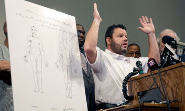 Shawn Parcells is seen at a news conference in St. Louis County