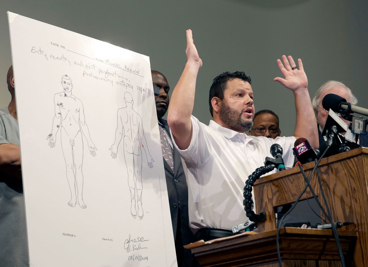 <i>Jeff Roberson/AP</i><br/>Shawn Parcells is seen at a news conference in St. Louis County