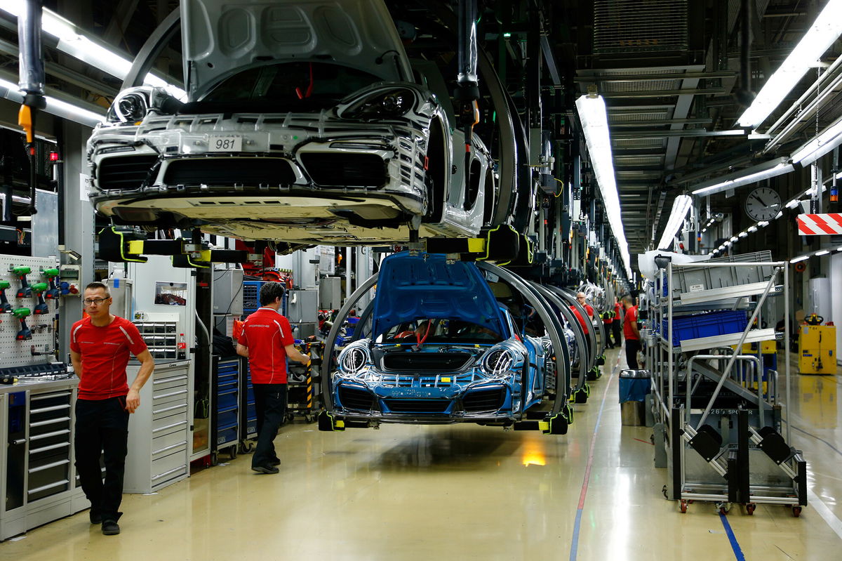 <i>Ralph Orlowski/Reuters</i><br/>The iconic Porsche brand is officially going public despite stomach-churning stock market turbulence that's frozen out other big deals. Porsche employees are pictured working at the Porsche factory in Stuttgart-Zuffenhausen