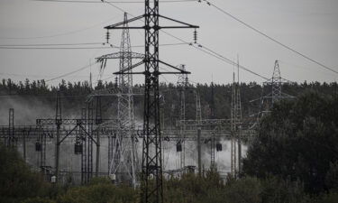 Smoke rises over Kharkiv's western outskirts as firefighters put out the fire after a Russian rocket attack hit an electric power station on September 12.