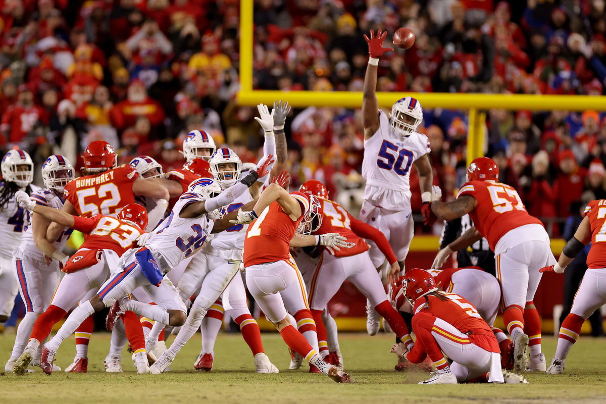 <i>David Eulitt/Getty Images</i><br/>Harrison Butker kicks the game-tying field goal for the Kansas City Chiefs against the Buffalo Bills at the end of the fourth quarter to send it in to overtime in the AFC Divisional game at Arrowhead Stadium on January 23.