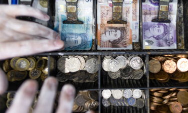 The British pound crashed below $1.10 by mid-afternoon on September 23. British pound banknotes and coins in a shop in Barking