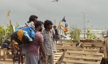 A demonstrator prepares to leave the protest site near the president's office in Colombo