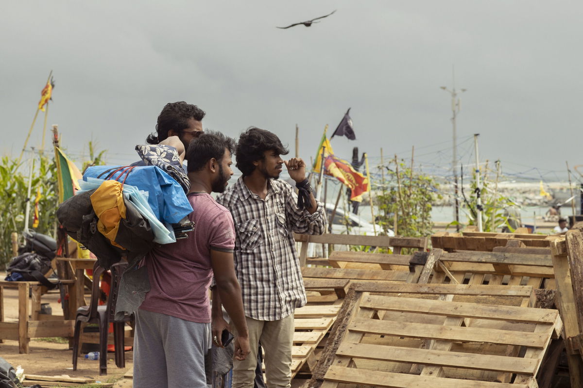 <i>Buddhika Weerasinghe/Getty Images</i><br/>A demonstrator prepares to leave the protest site near the president's office in Colombo