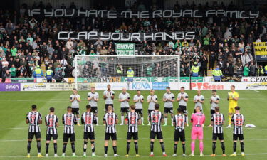 Celtic fans held up banners during the minute's applause.