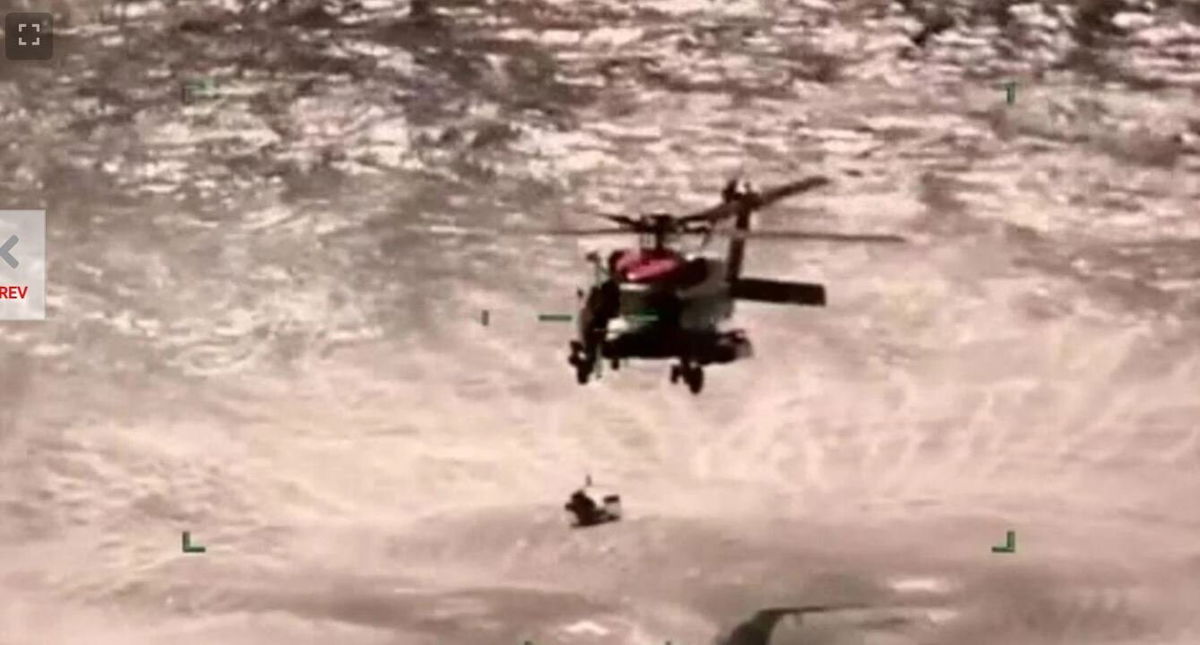 <i>USCG/KTBS</i><br/>Missing boaters were rescued after an apparent shark attack off the Louisiana coast.