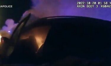 Incredible video shows the moment Alhambra police officers pulled an injured driver from a burning vehicle after it crashed.