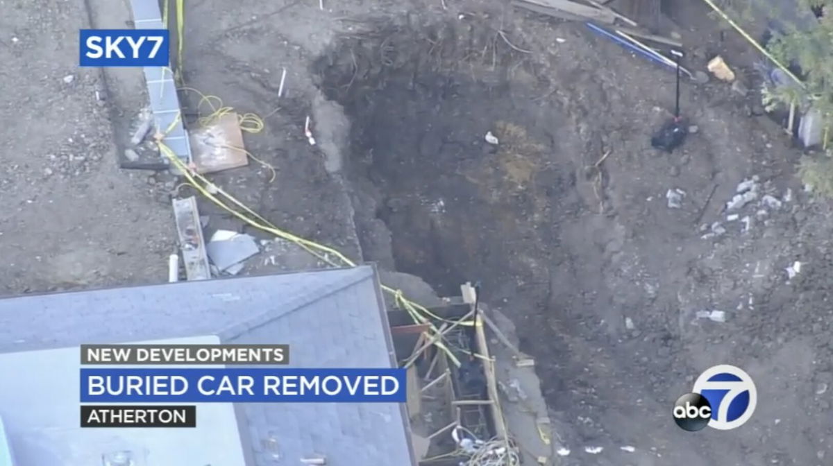 <i>KGO</i><br/>Investigators say they have removed a car that was found earlier this week buried in the backyard of a multi-million dollar mansion in Atherton.