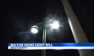 Maui Mayor Michael Victorino signed a controversial bill that regulates lighting in the county.