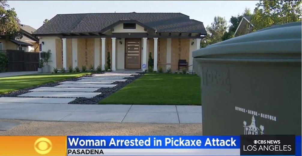 <i>KCAL</i><br/>A woman smashed the windows of this house with a pickaxe.