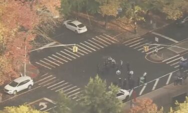 Officials said a 14-year-old boy was shot in the ankle after finishing classes while waiting outside the school for sports practice to begin. An NYPD school safety agent acted quickly and tended to the freshman's wound until an ambulance arrived.