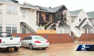 Firefighters rescued a young child from a burning building in Oklahoma City.