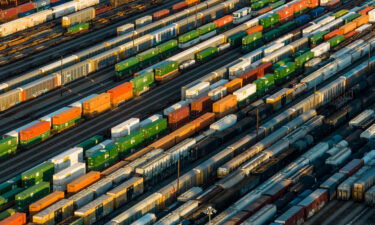 Freight train cars sit in a Norfolk Southern rail yard on September 14 in Atlanta. Three hundred business groups are calling on President Joe Biden to intervene in the ratification of the national tentative agreement between rail unions and US freight railroads.