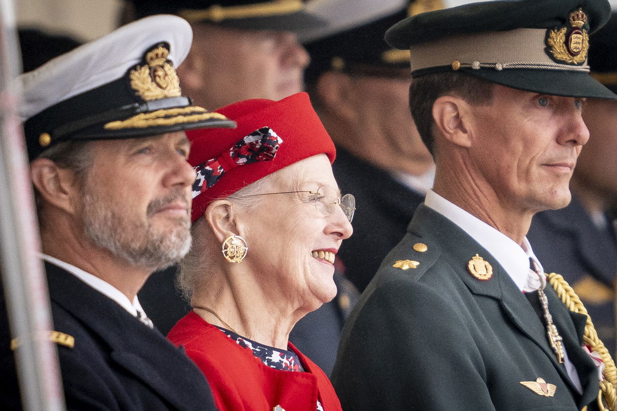 <i>Mads Claus Rasmussen/Ritzau Scanpix/AFP/Getty Images</i><br/>Queen Margrethe is flanked by her sons Crown Prince Frederik (L) and Prince Joachim (R) as she attends festivities in Korsoer