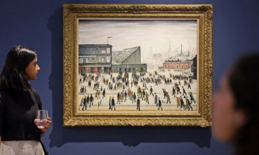 L.S. Lowry's "Going to the Match" is displayed in Dubai earlier this month.