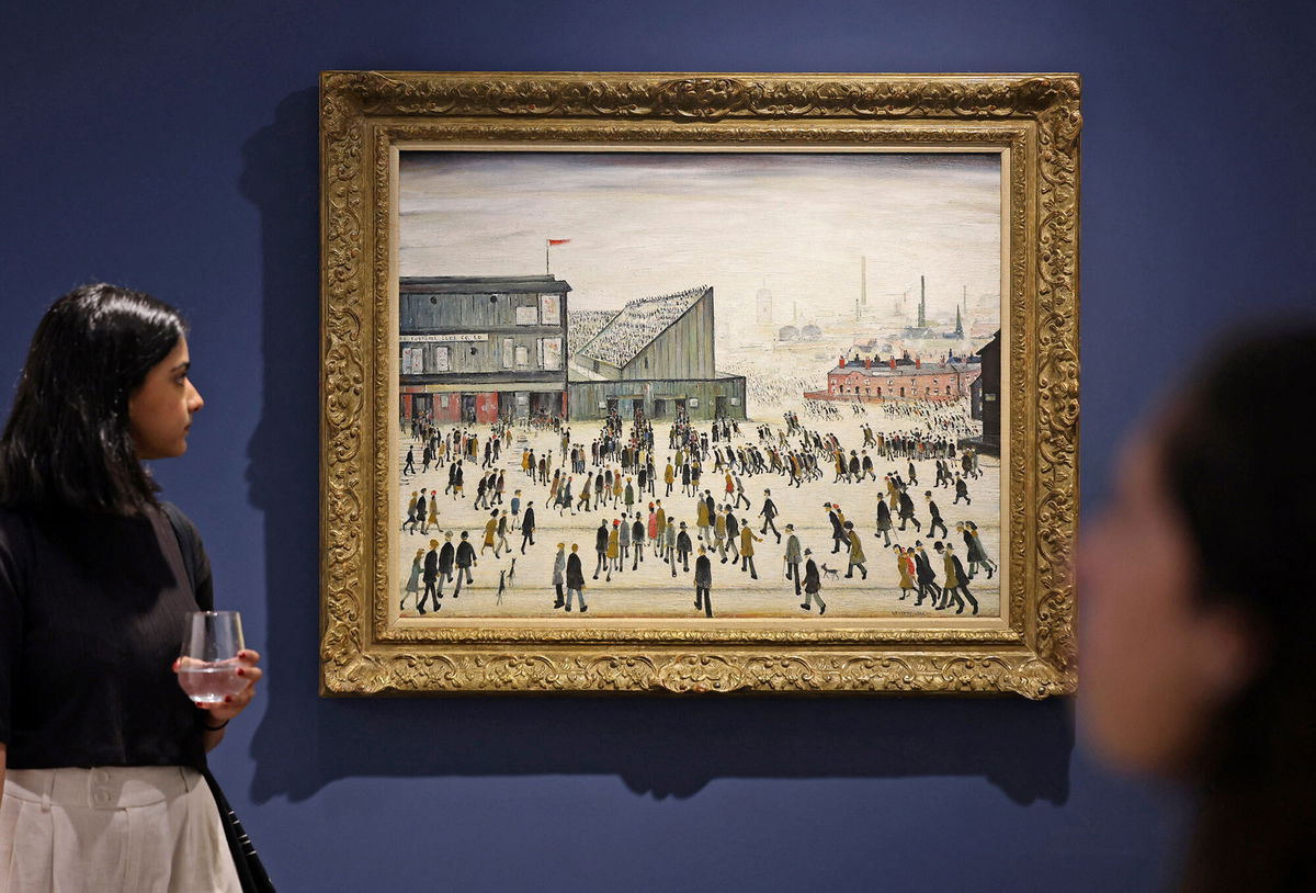 It's our Mona Lisa': L.S. Lowry's 'Going to the Match' faces