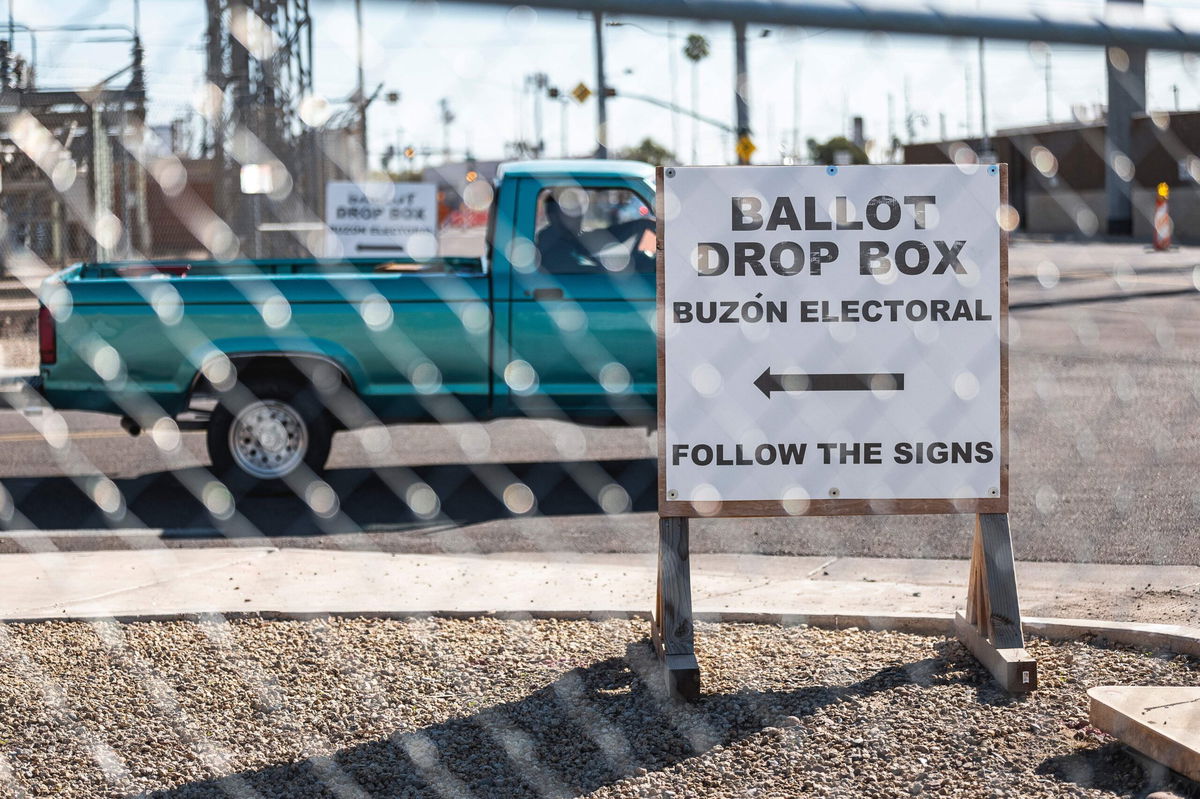 <i>Olivier Touron/AFP/Getty Images</i><br/>Fences surround the Maricopa County Tabulation and Elections Center (MCTEC) in Phoenix