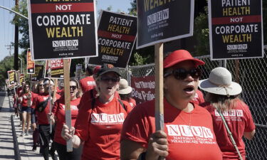 California mental health workers vote Friday to end the 10-week strike. Kaiser Permanente mental health workers and supporters here march outside a Kaiser facility in Sacramento