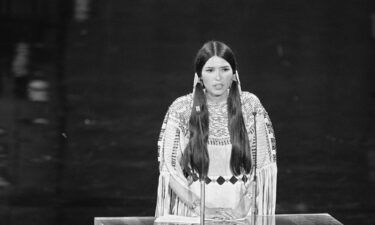 Sacheen Littlefeather speaks on behalf of Marlon Brando at the 45th Academy Awards.