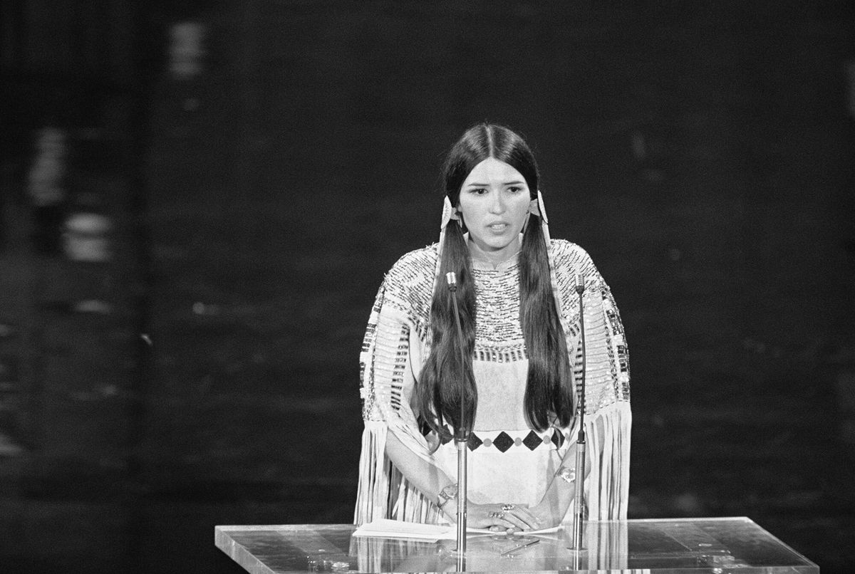 <i>Bettmann Archive/Getty Images</i><br/>Sacheen Littlefeather speaks on behalf of Marlon Brando at the 45th Academy Awards.