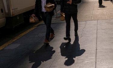 Wages and salaries for civilian workers increased by 1.3% in the third quarter and 5.1% over the year ending in September. Pedestrians are pictured here in San Francisco on October 10.