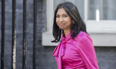 Suella Braverman leaves as Britain's Home Secretary.