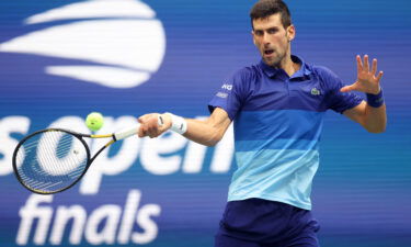 Novak Djokovic of Serbia returns the ball against Daniil Medvedev of Russia during their Men's Singles final match on Day Fourteen of the 2021 US Open at the USTA Billie Jean King National Tennis Center on September 12