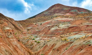 The mountains' colors are produced by groundwater that have altered the oxidation state of the iron compounds in the earth.